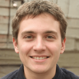 Front-facing sample portrait with a natural smile